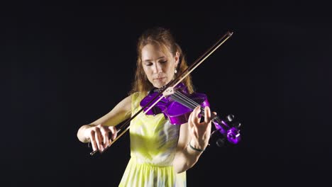 Beautiful-violinist-woman-playing-violin,-dancing.